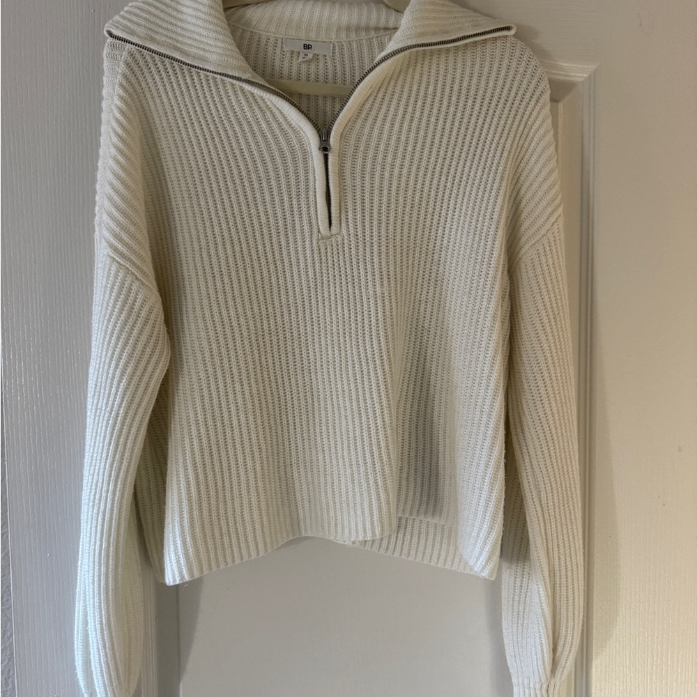 QUARTER ZIP